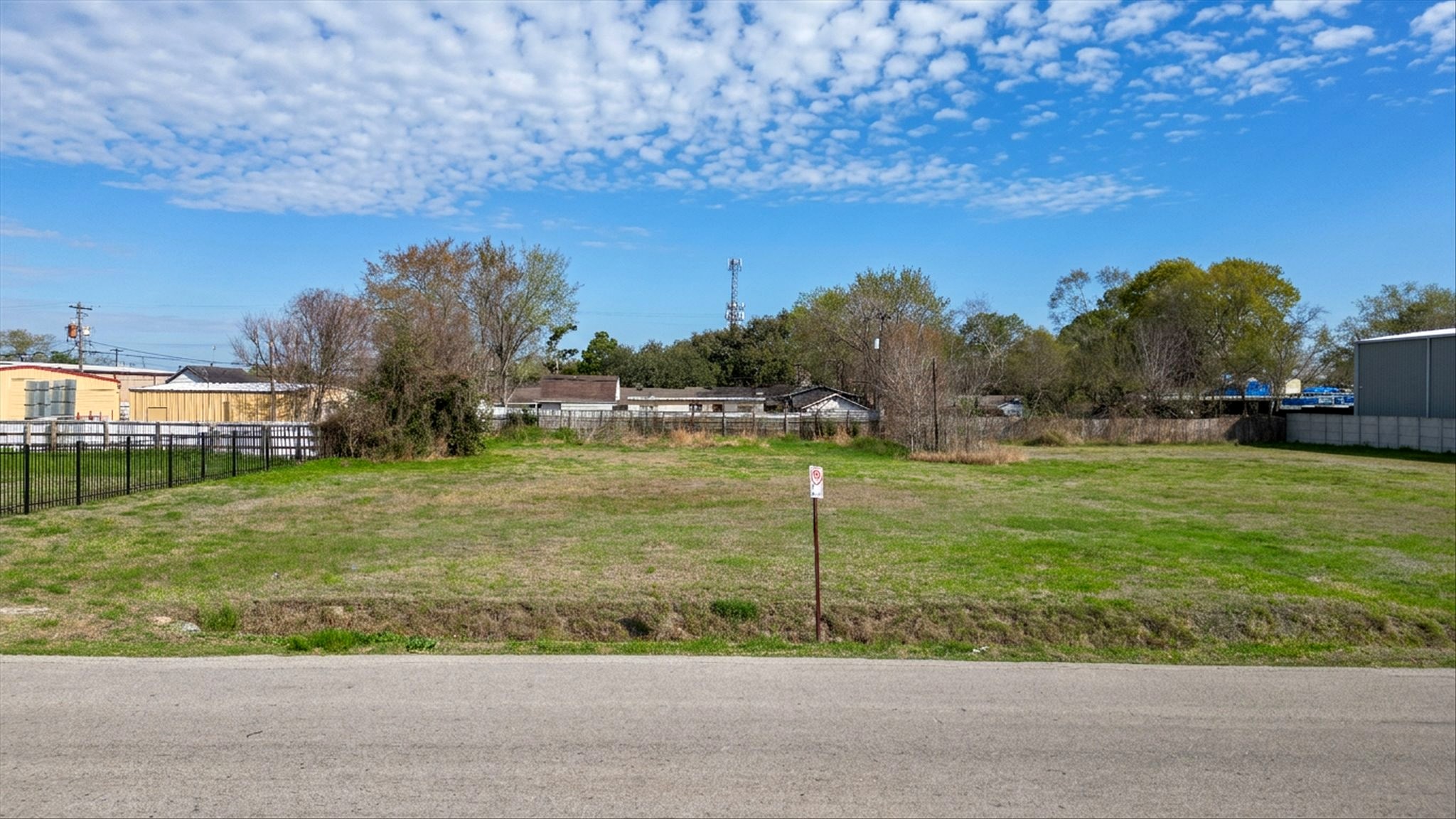 Aerial view of property with neighborhood surrounding